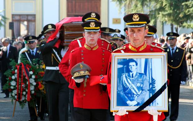 Description : The funeral procession for the self-styled king of Albania, Leka Zogu is seen in Tirana Saturday, Dec. 3, 2011. Albania is holding a funeral for Leka Zogu, the self-proclaimed heir to the royal throne of his father who served as king for 11 years before World War II. Zogu, who returned home from exile to try to claim the throne himself, died Wednesday of a heart attack. He was 72. (AP Photo/Hektor Pustina)